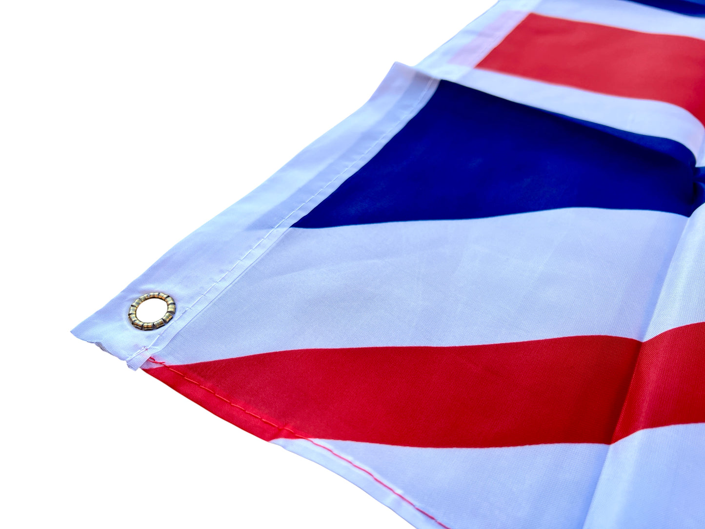 Close-up of a flag with blue, white, and red stripes on a white background