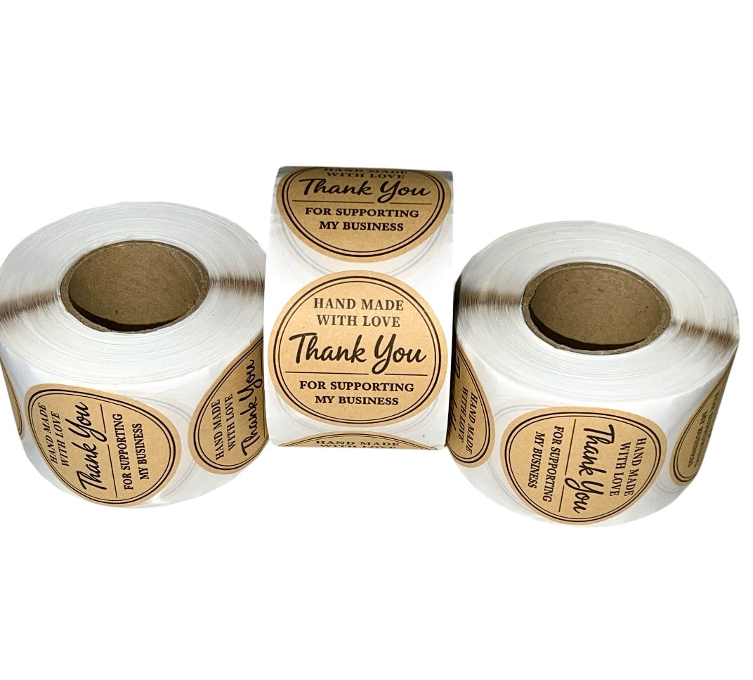 Three rolls of round stickers with 'Thank You' text on a white background